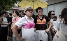 Bra-wearing activists march Hong Kong protest